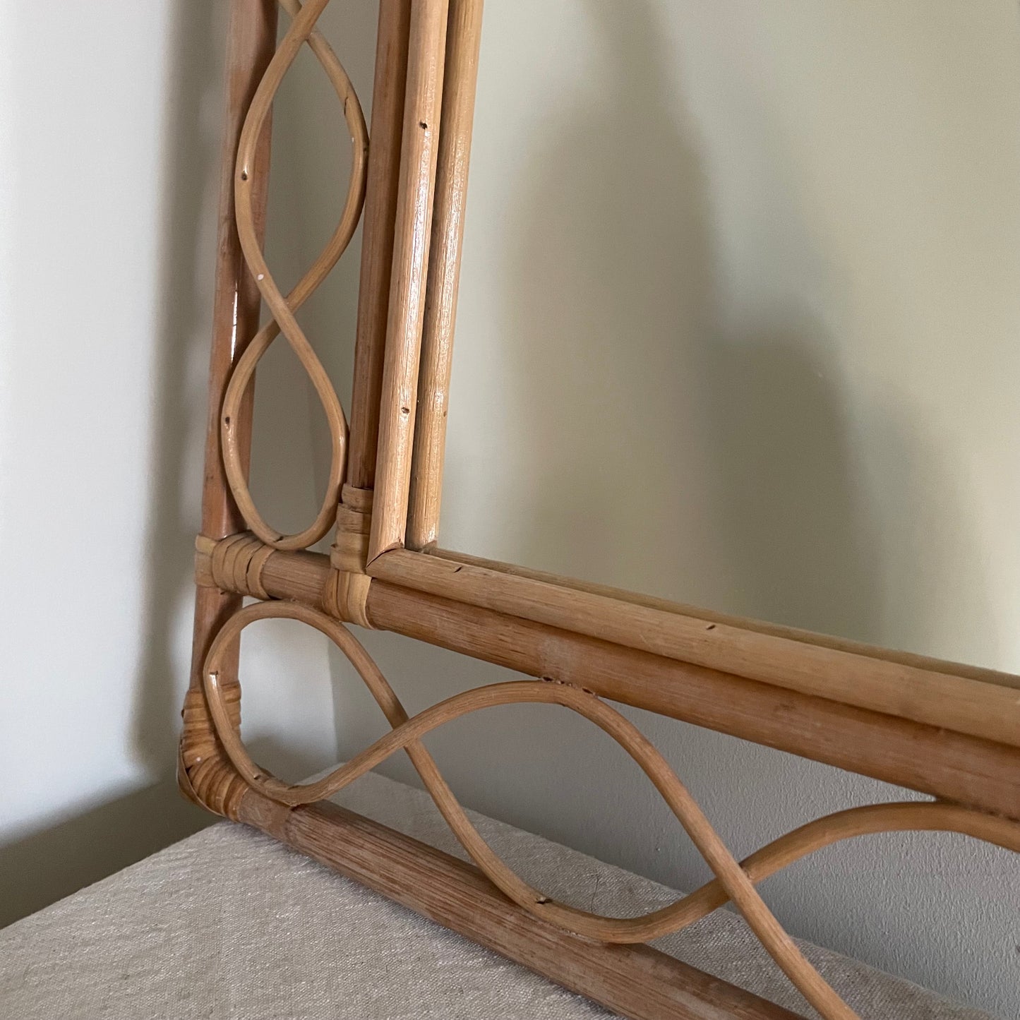 Bamboo and rattan vertical mirror with swirls