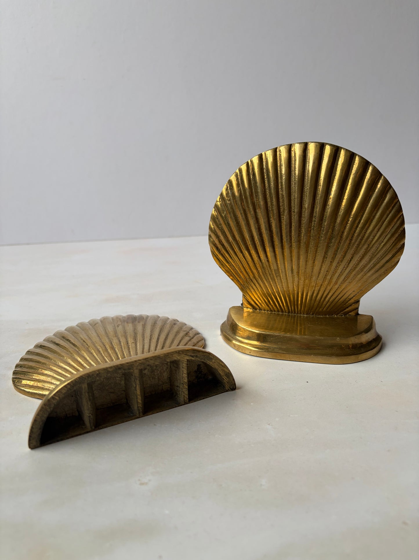 Pair of vintage solid brass shell bookends