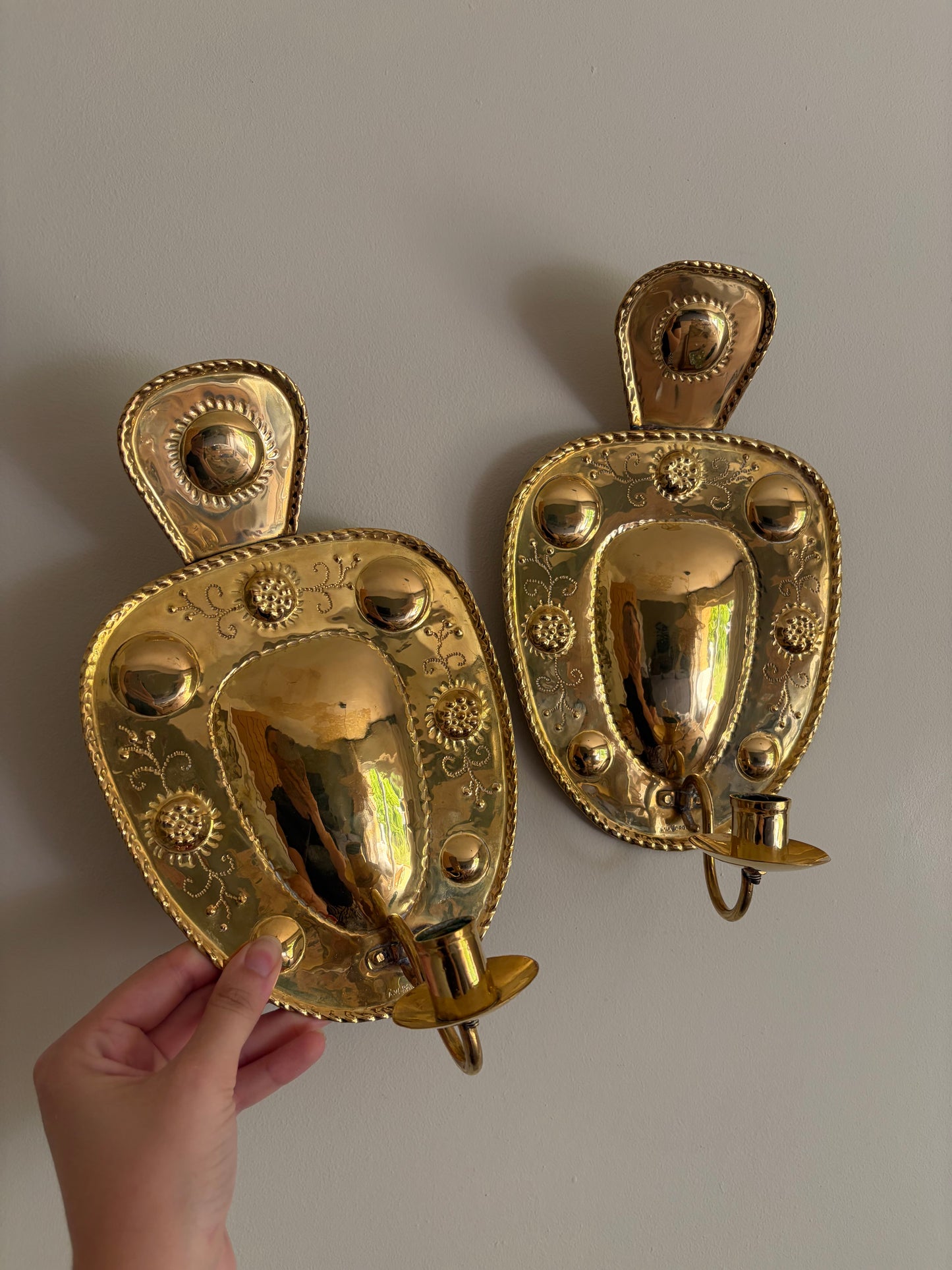 Pair of small vintage Swedish brass embossed candle wall sconces