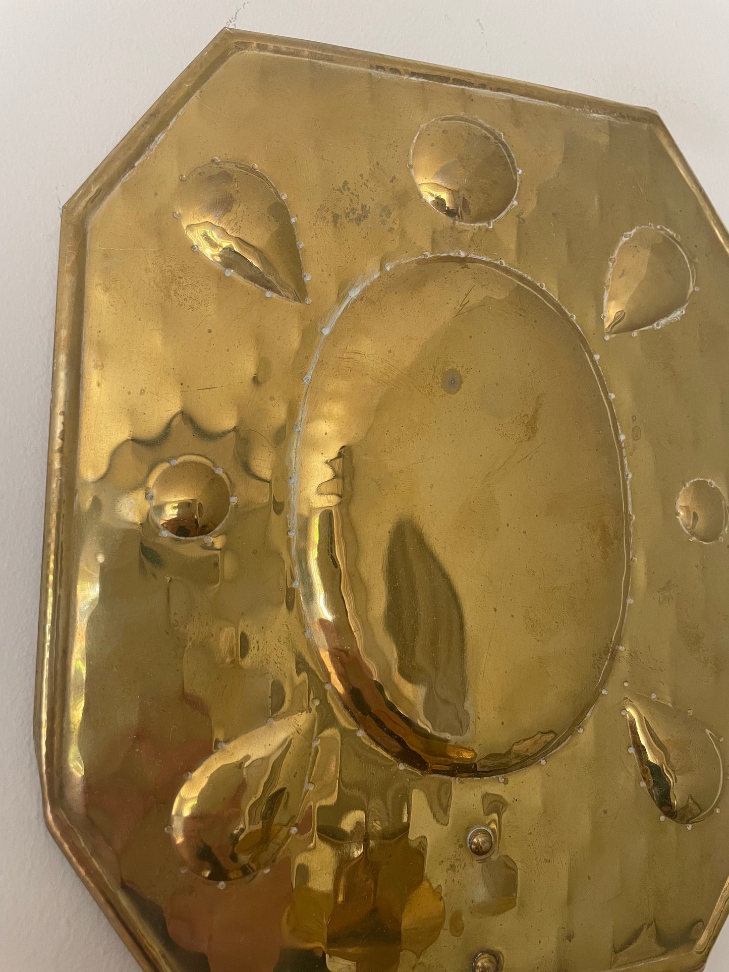 Pair of brass octagonal sconces with embossed circles