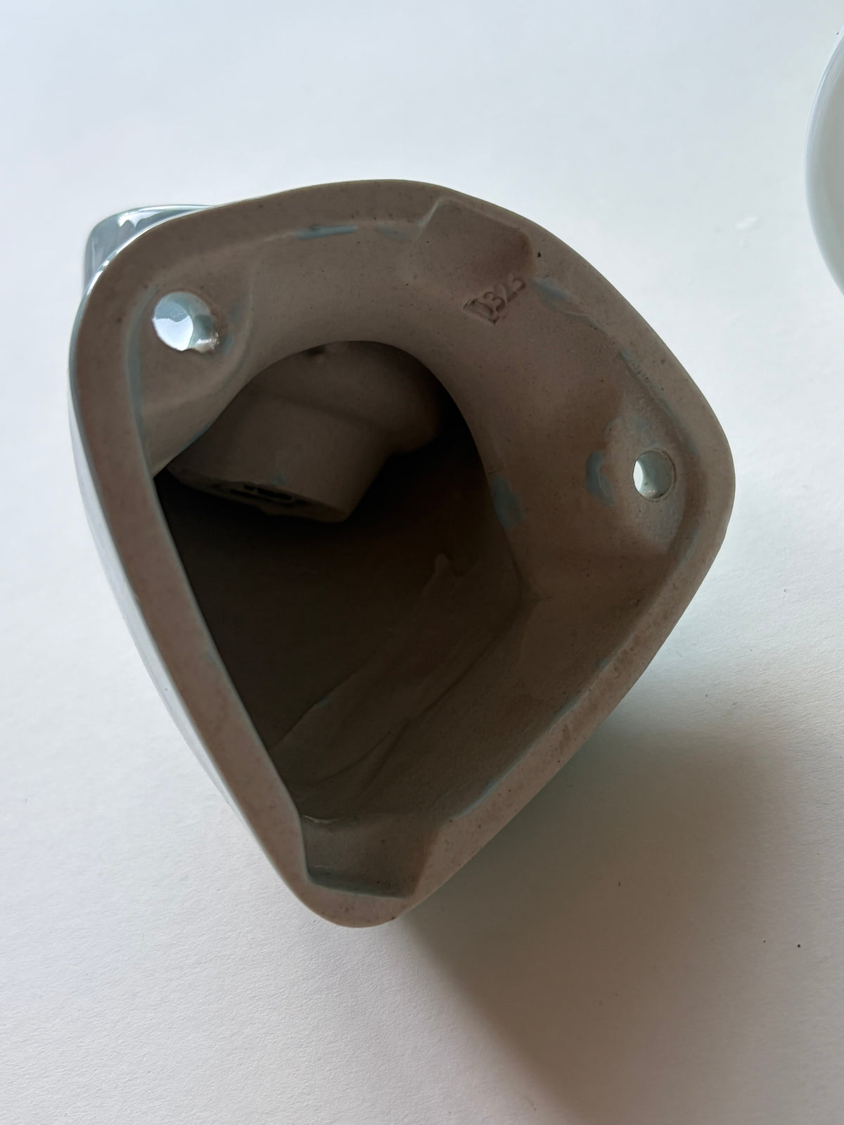 Pair of Sigvard Bernadotte blue ceramic wall lights