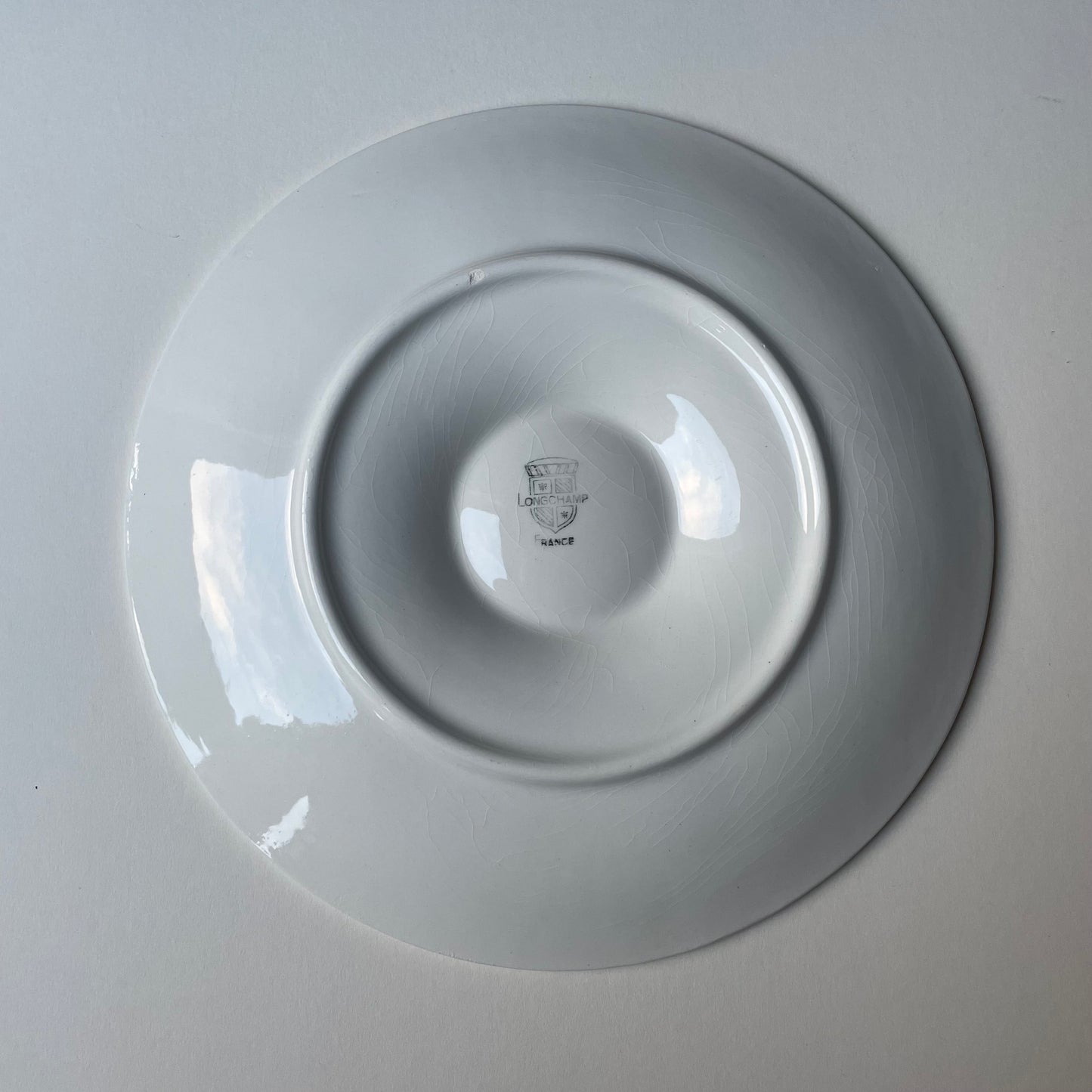 French white oyster plates by Long Champ