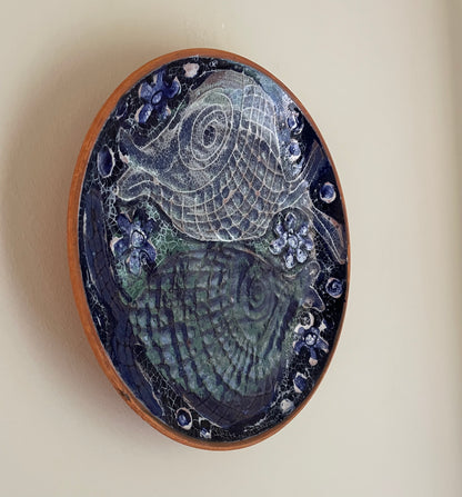 Blue wall plate of fish
