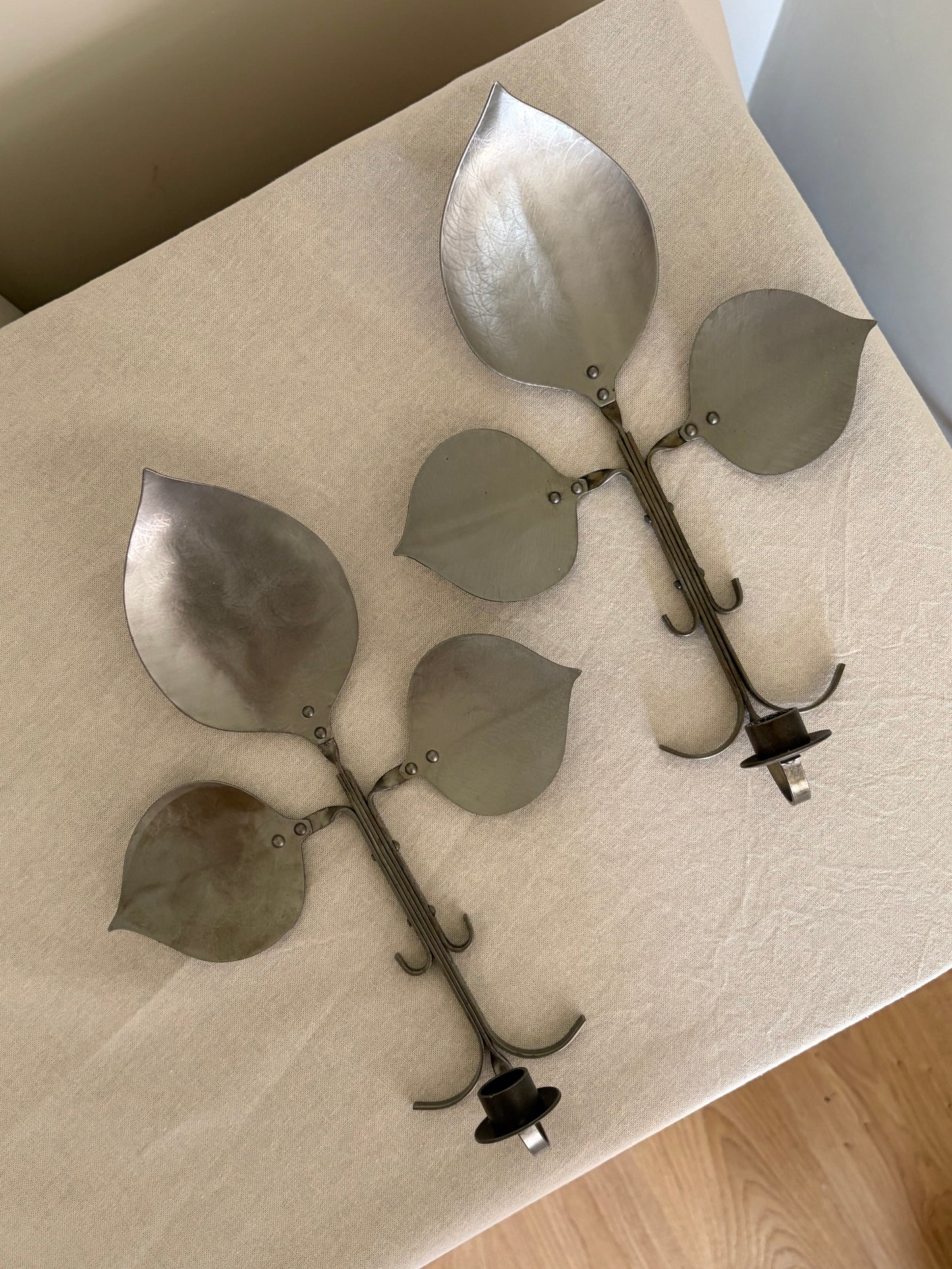 Pair of vintage pewter leaf shaped candle sconces