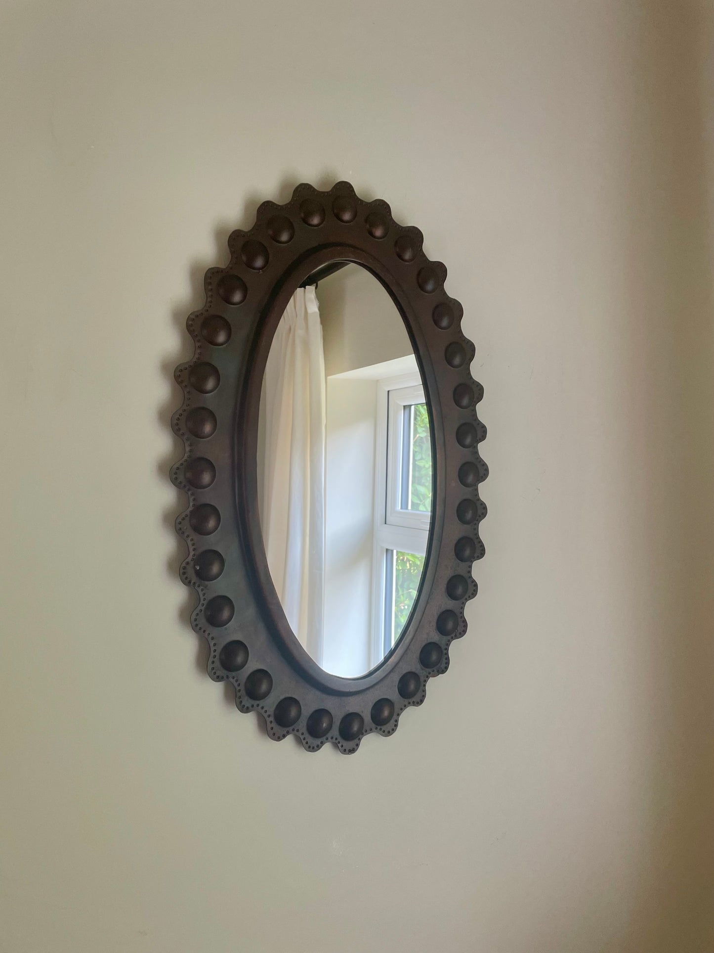 Metal scalloped oval mirror