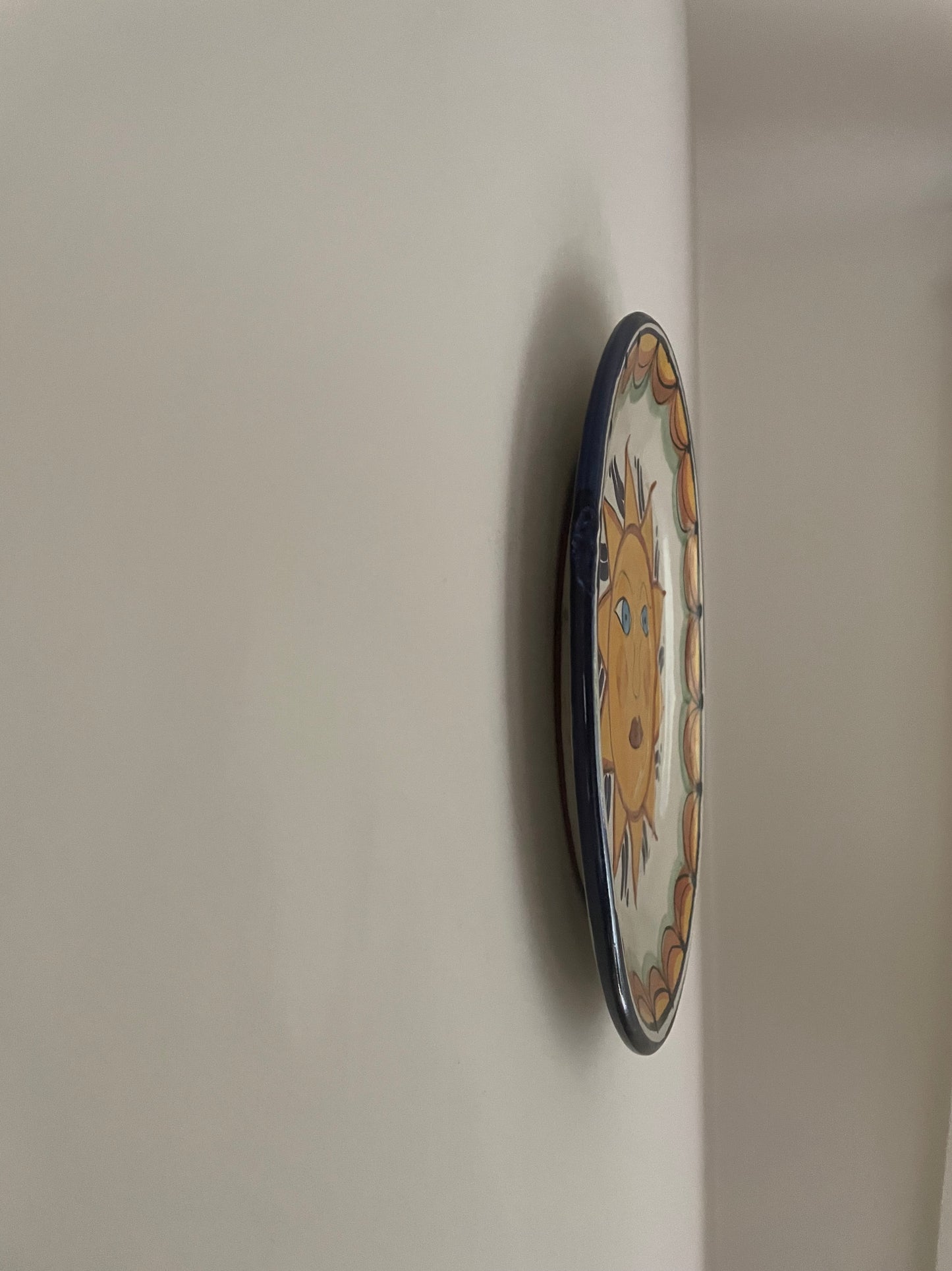 Vintage hand painted Mexican wall plate of sun