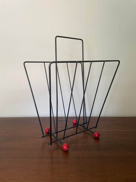 Vintage retro black metal atomic magazine/record holder with red wooden ends