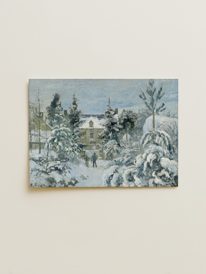 Snow covered trees in the garden