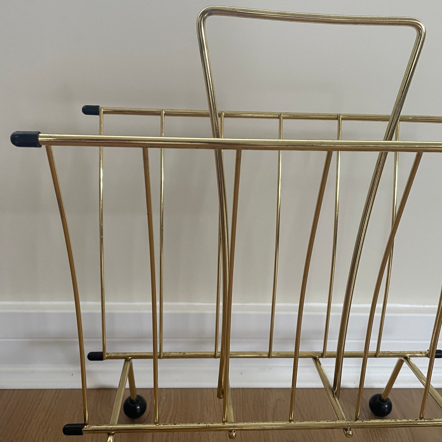 Gold metal magazine rack