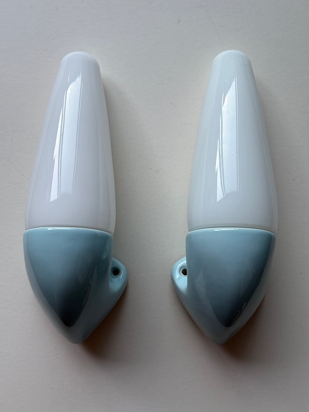 Pair of Sigvard Bernadotte blue ceramic wall lights