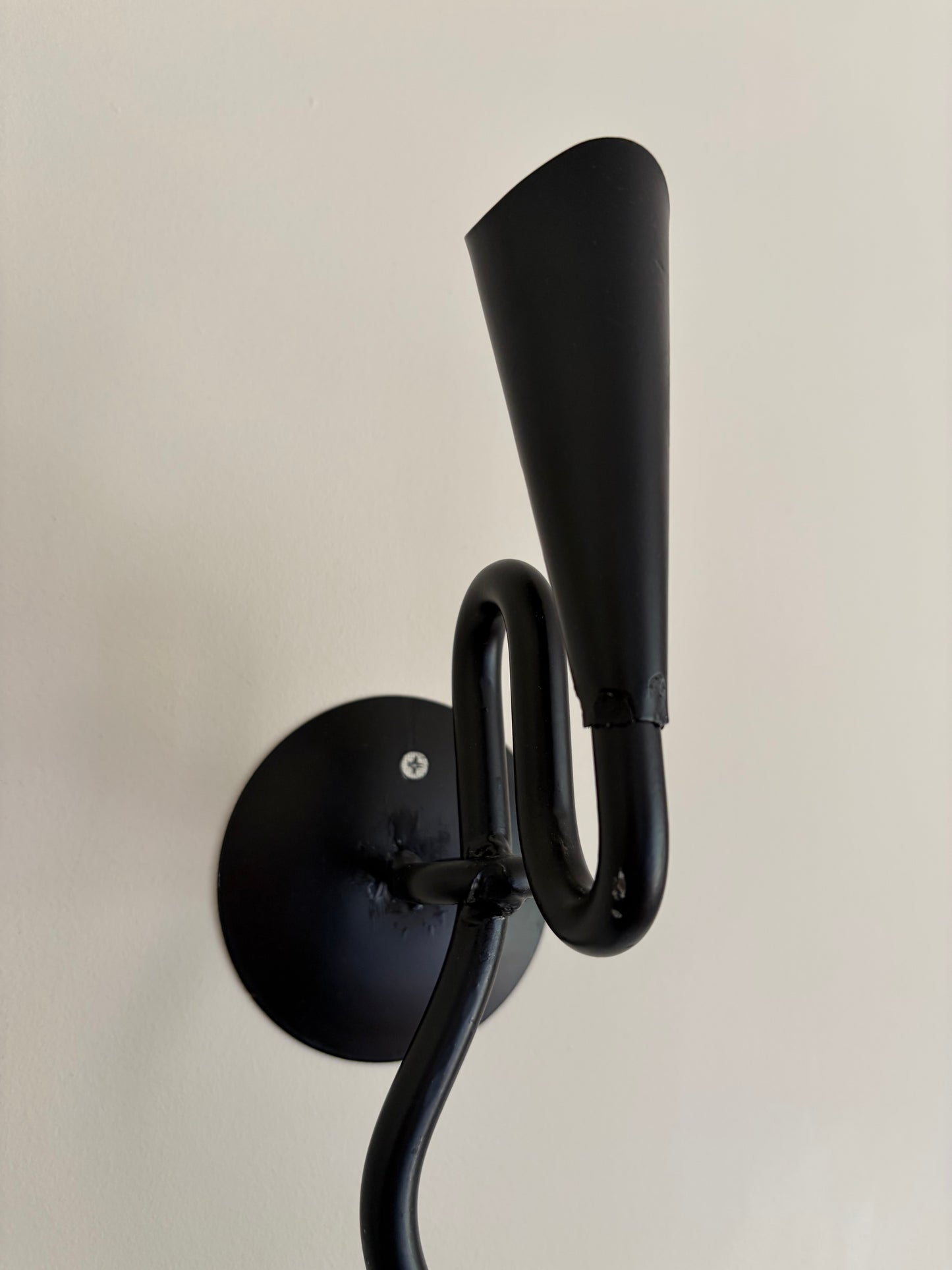 Pair of vintage wrought iron black squiggle candle wall sconces