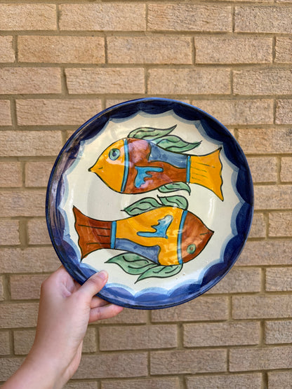 Vintage hand painted Mexican wall plate of colourful fish