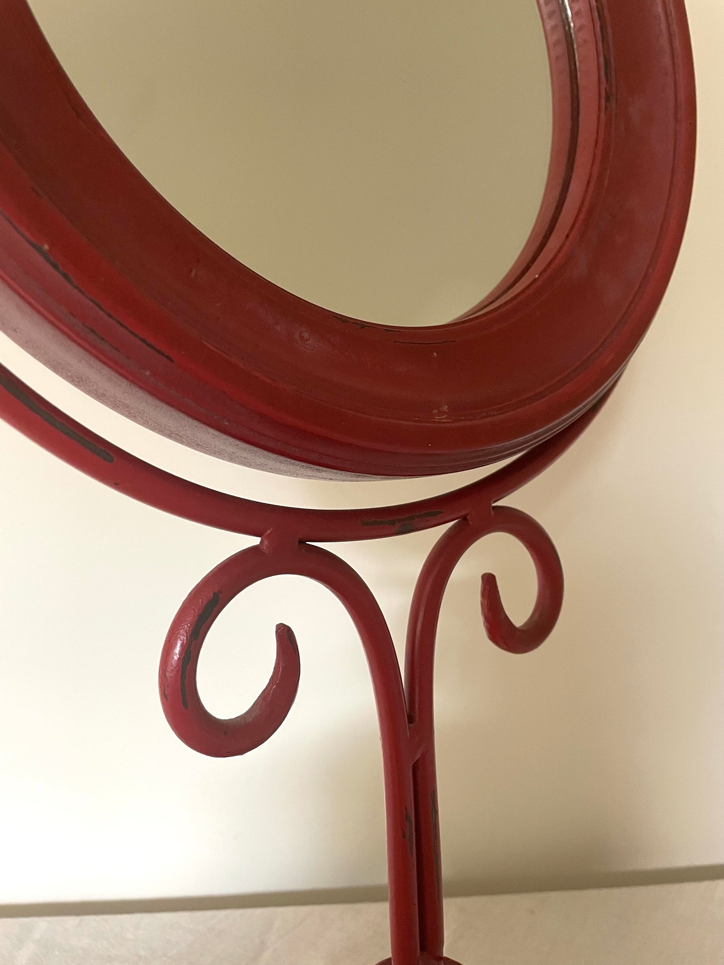 Red cast iron vintage mirror