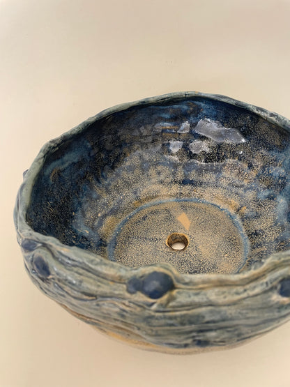 Handmade blue pottery bowl