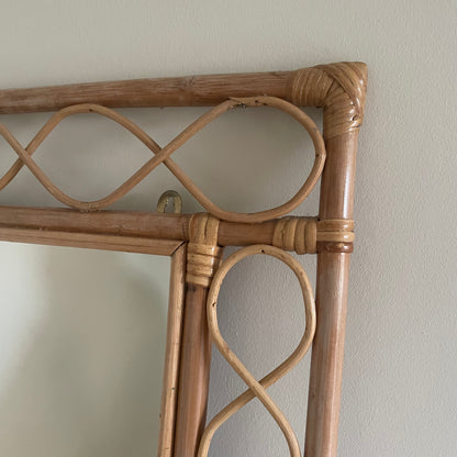 Bamboo and rattan vertical mirror with swirls