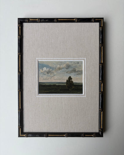 Framed cloudy countryside with mount