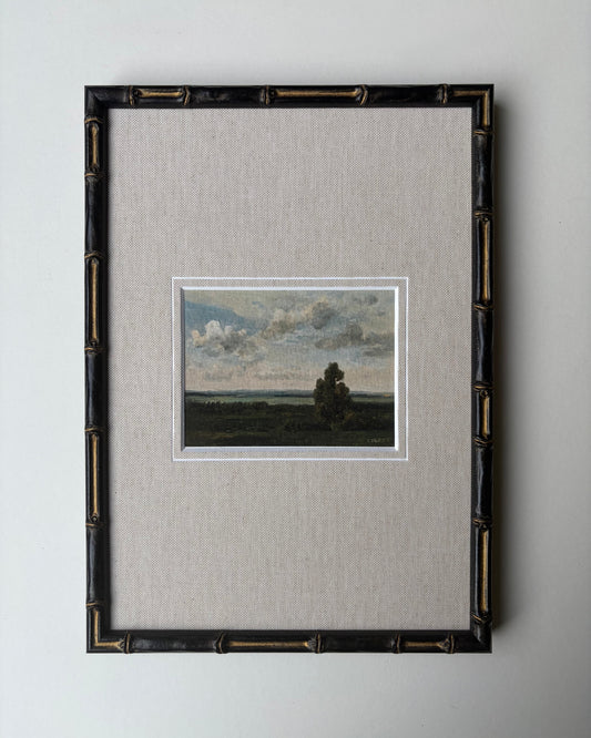 Framed cloudy countryside with mount