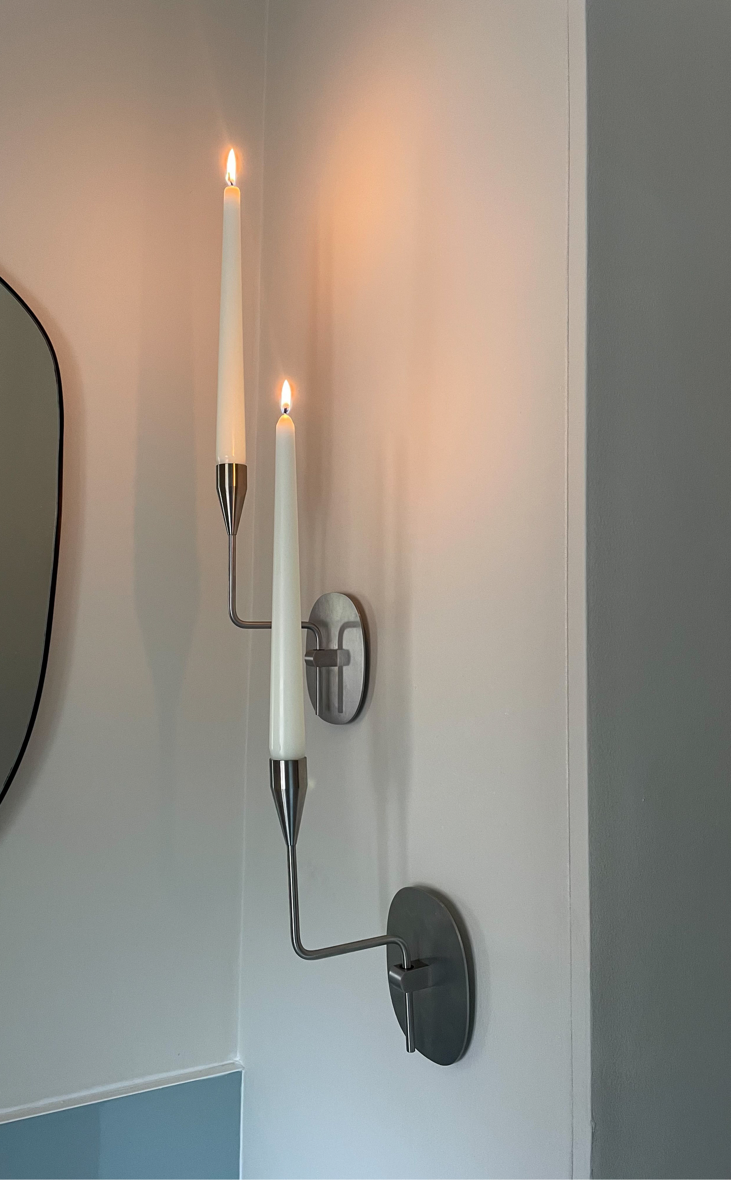 Pair of vintage stainless steel candle sconces by Piet Hein