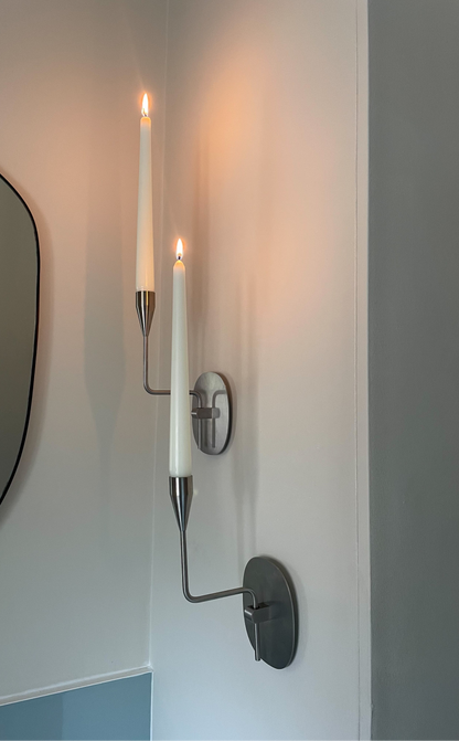 Pair of vintage stainless steel candle sconces by Piet Hein