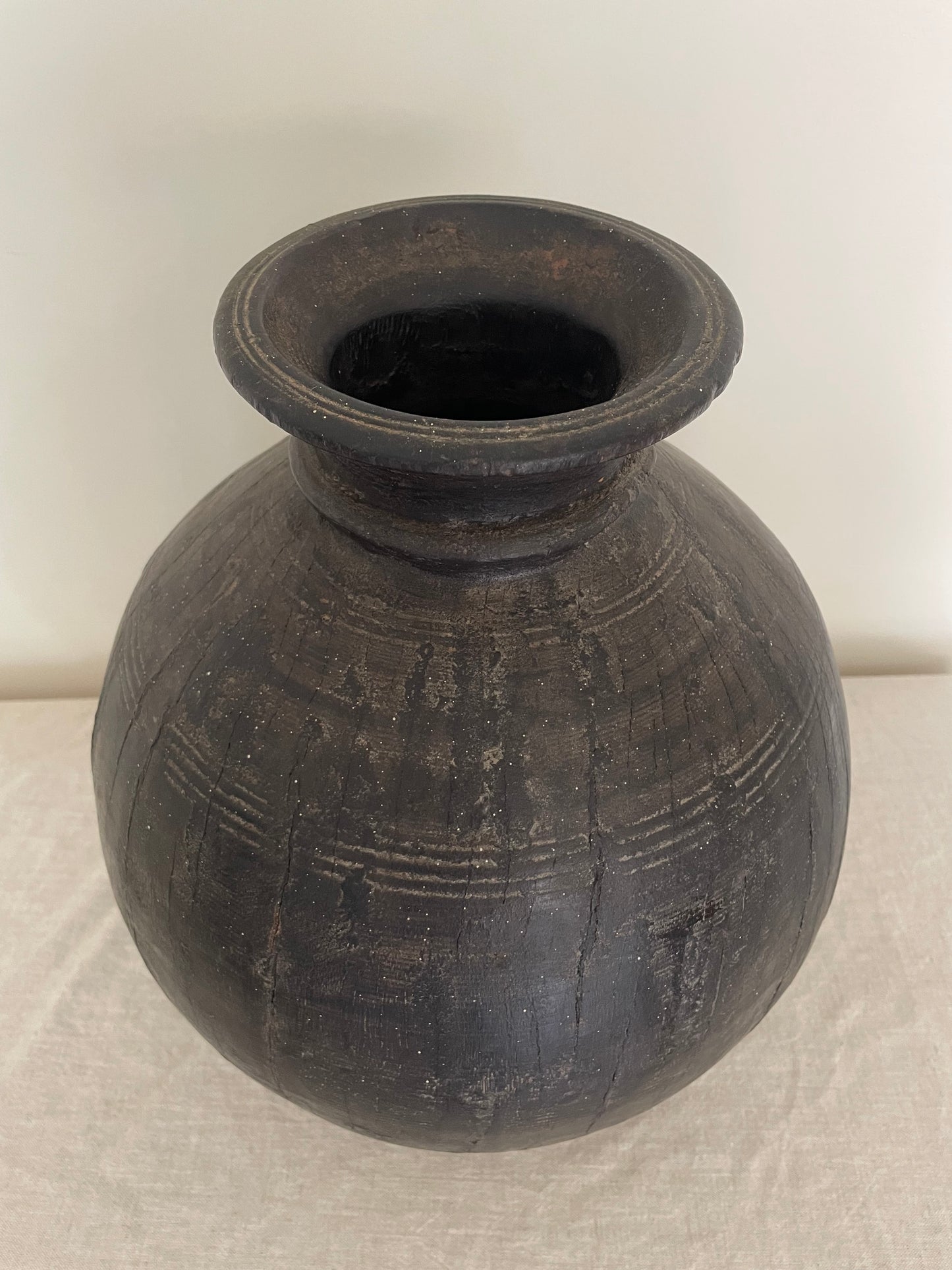 Dark wooden vintage vase