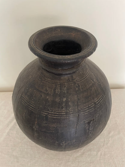 Dark wooden vintage vase