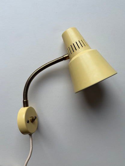 Vintage butter yellow small midcentury wall light with brass gooseneck