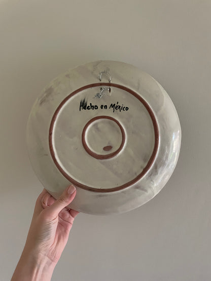 Vintage hand painted Mexican wall plate of sun