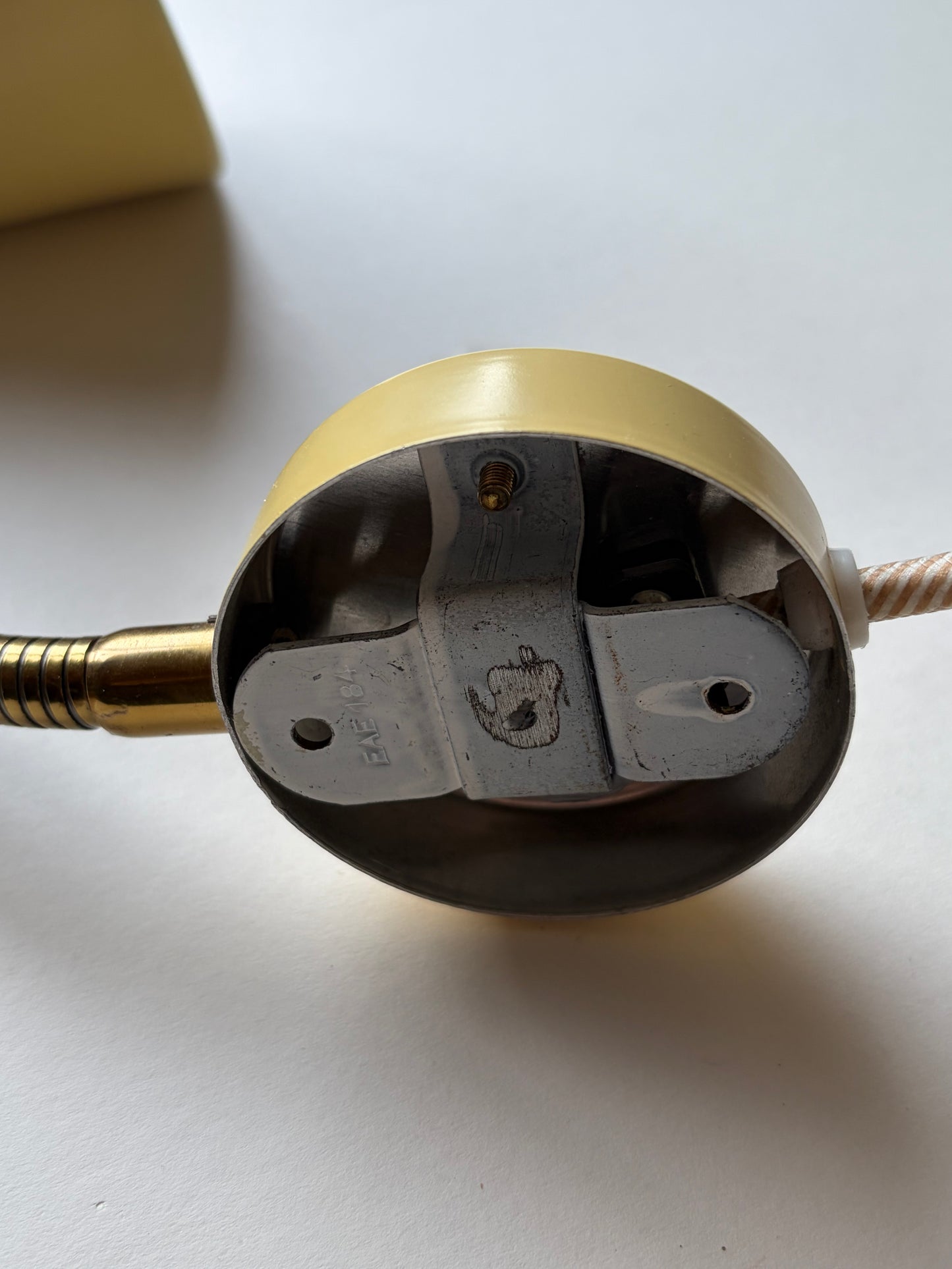Vintage butter yellow small midcentury wall light with brass gooseneck