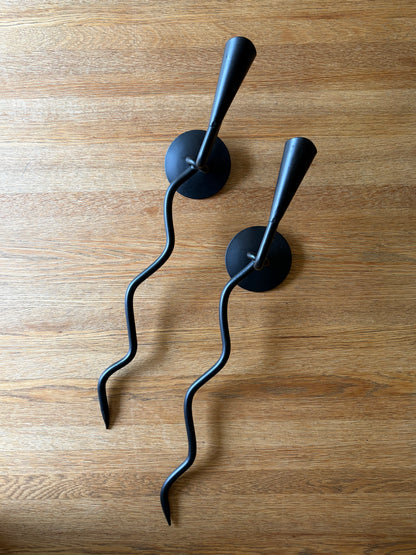 Pair of vintage wrought iron black squiggle candle wall sconces