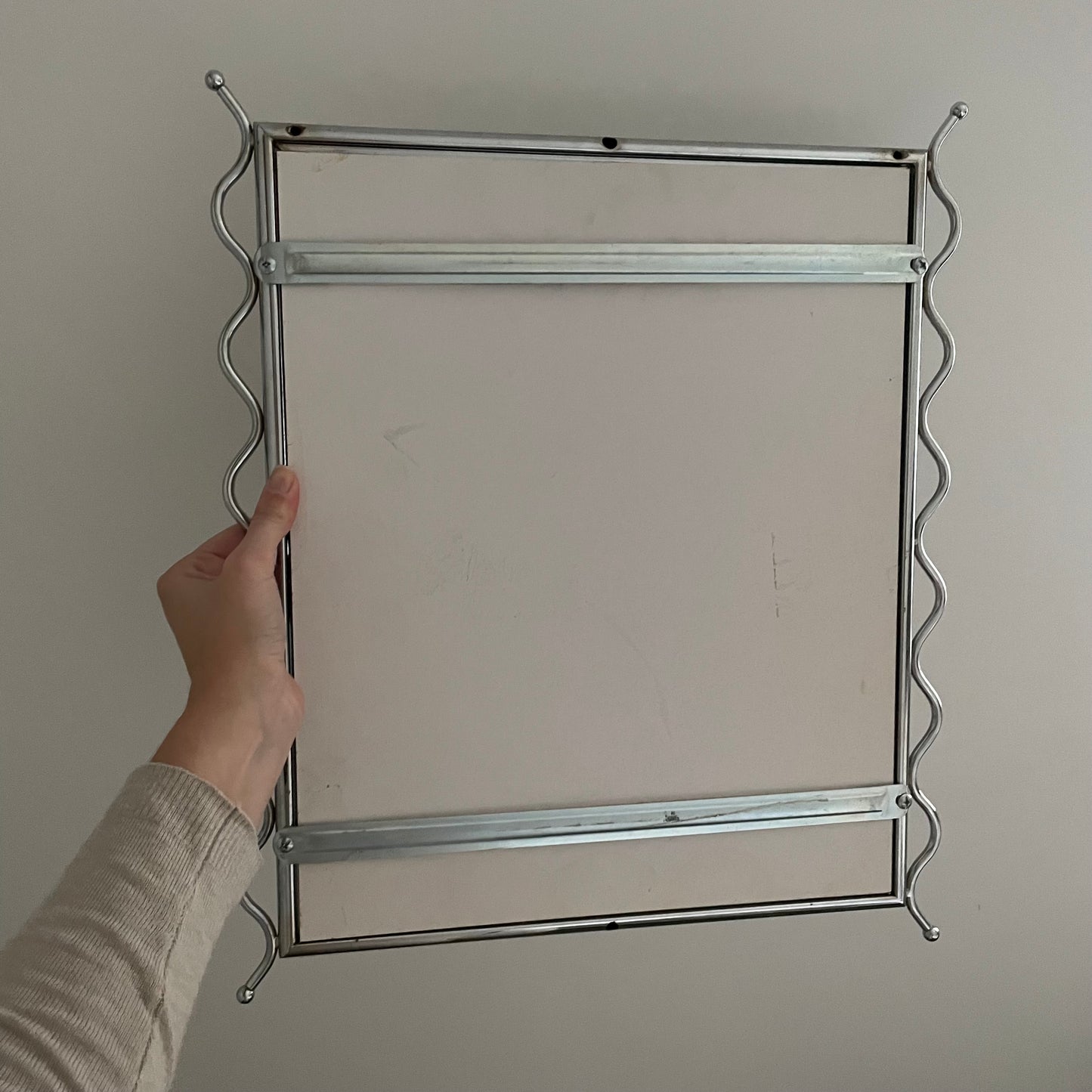 Chrome vintage mirror with wavy edges