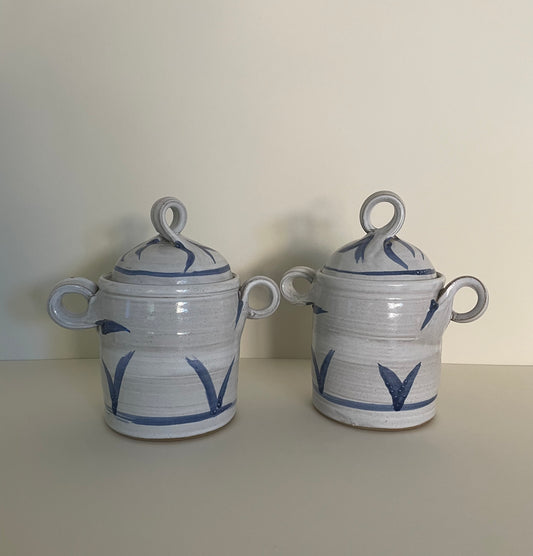 Pair of ceramic handmade canisters in blue and white