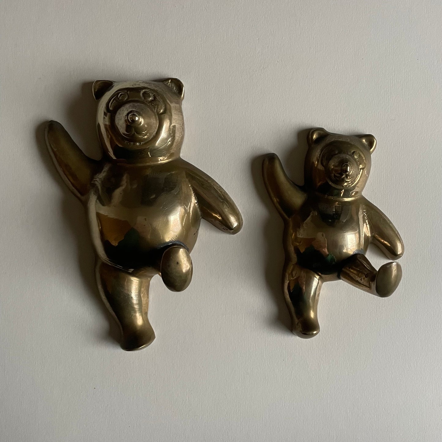 Pair of brass dancing bear wall hooks