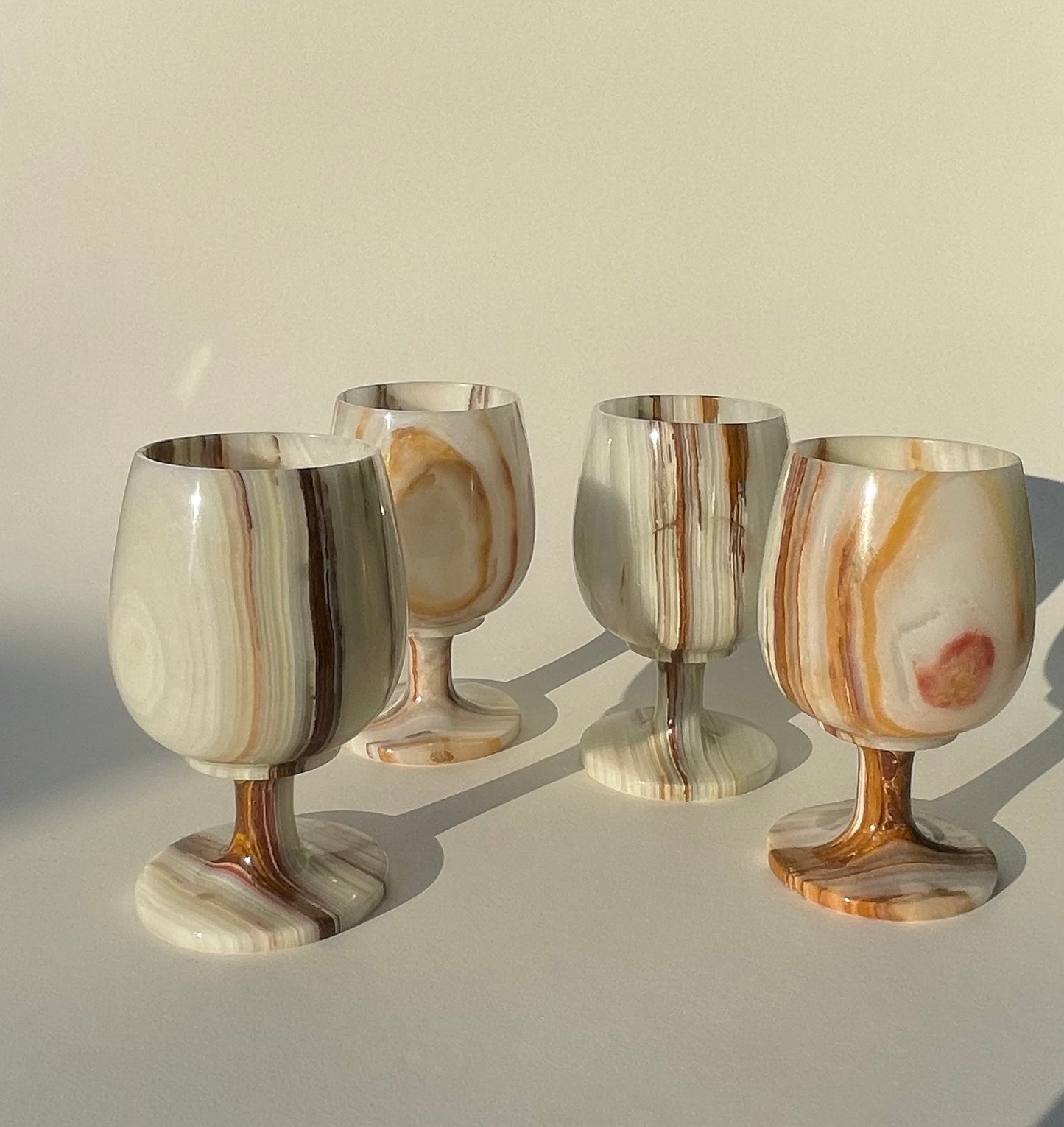 Set of four onyx white and brown goblets