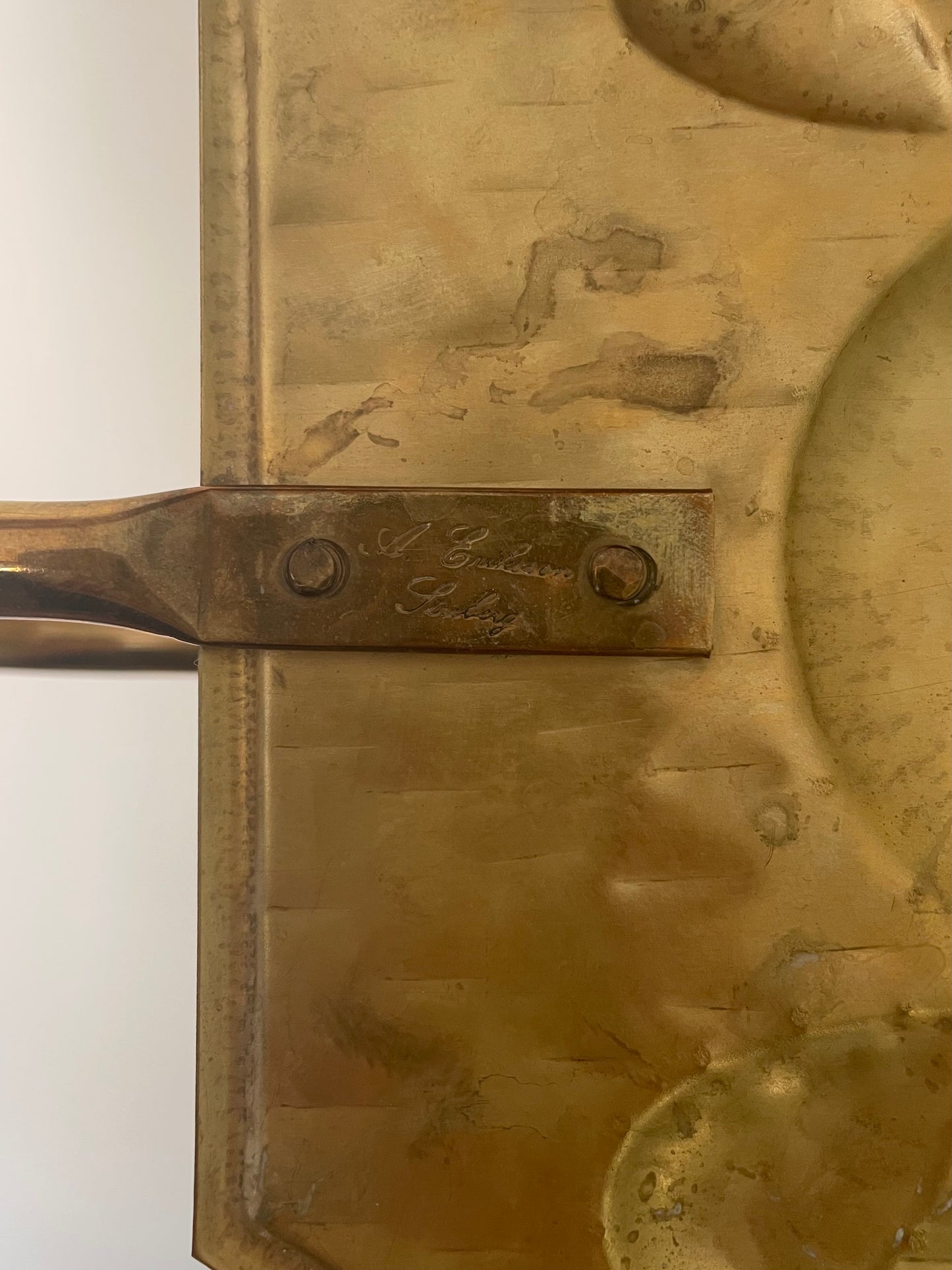 Pair of brass octagonal sconces with embossed circles