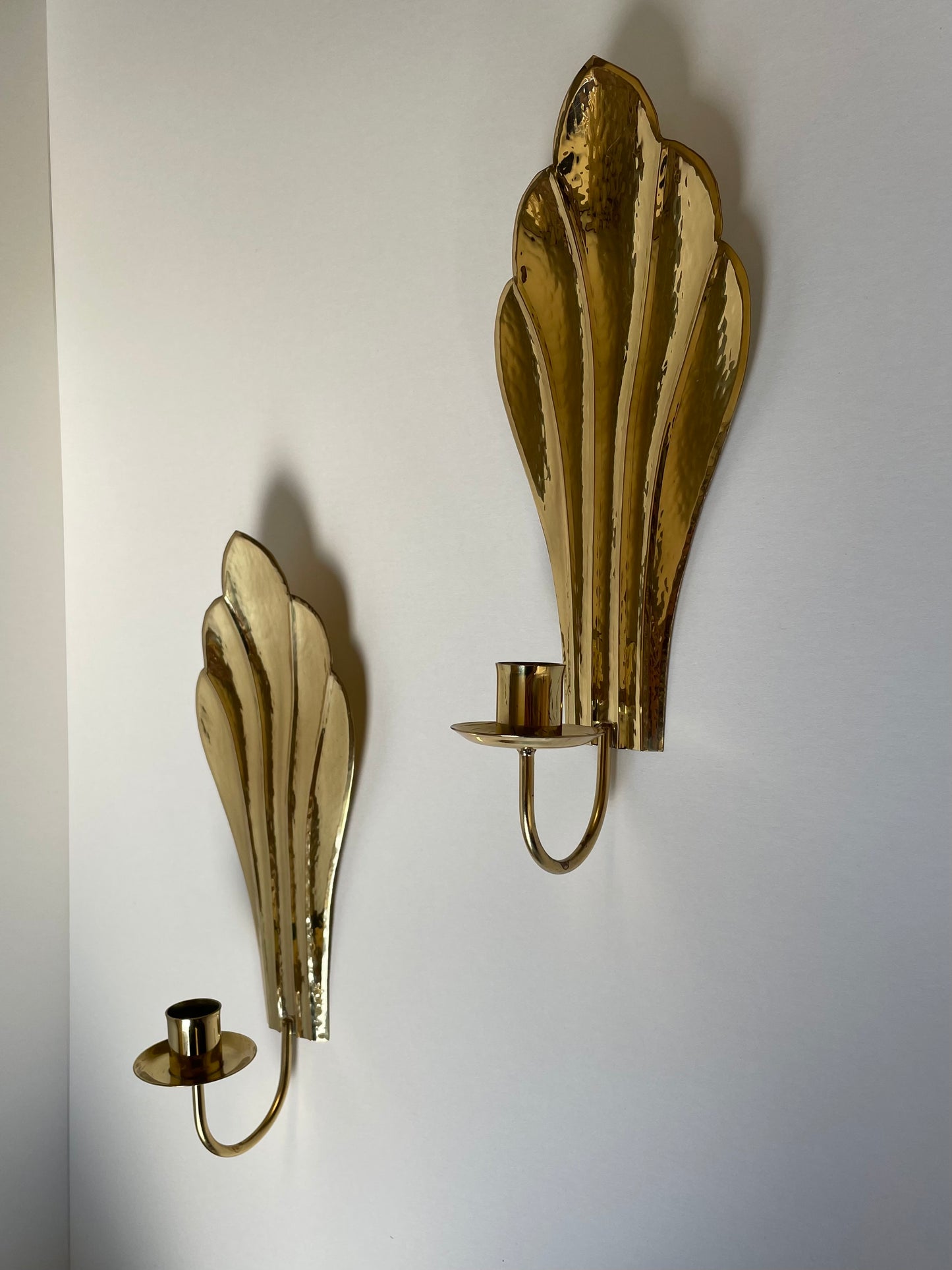 Brass hammered shell wall sconces