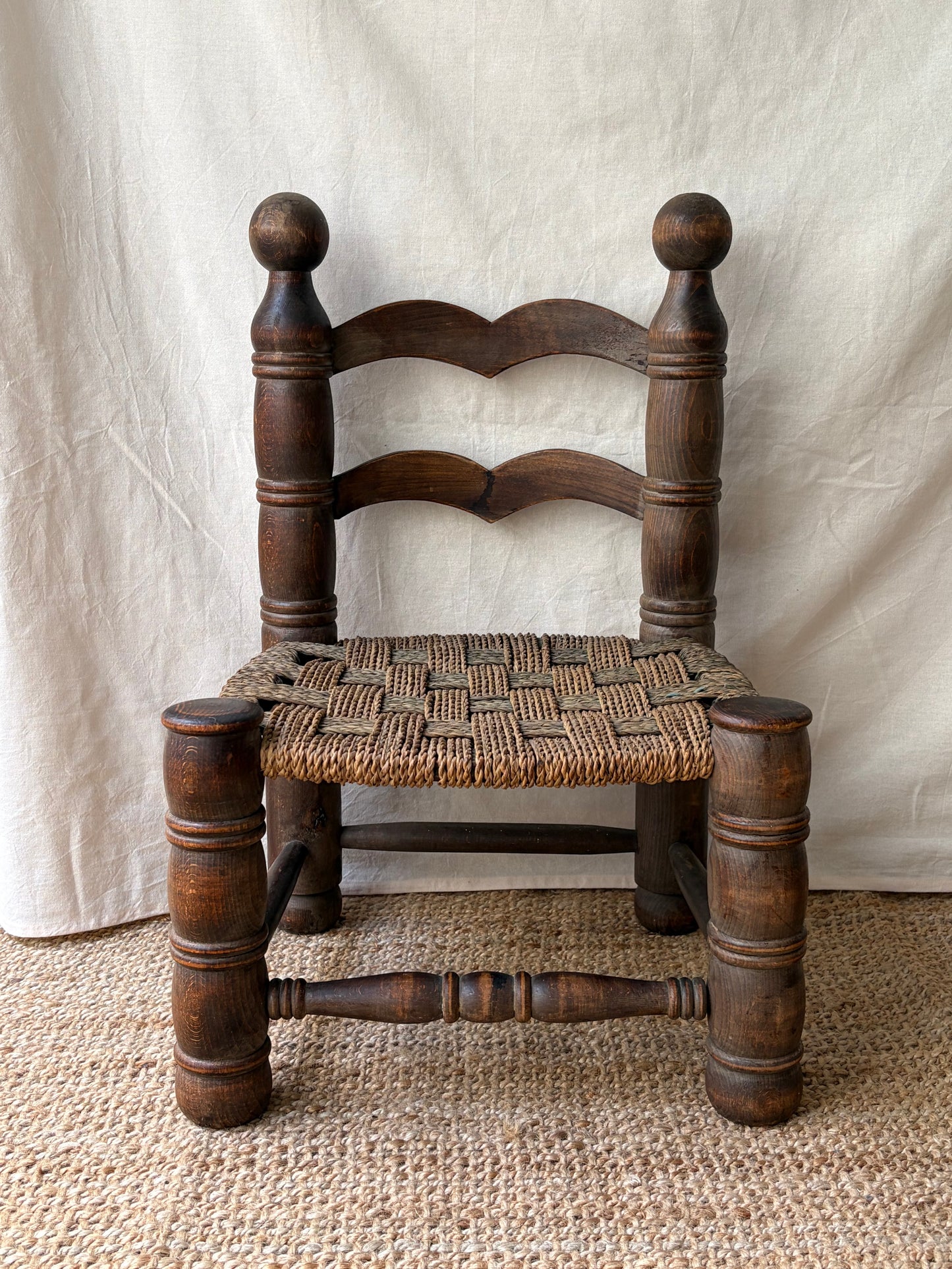 Low oak rush-seat chair attributed to Charles Dudouyt