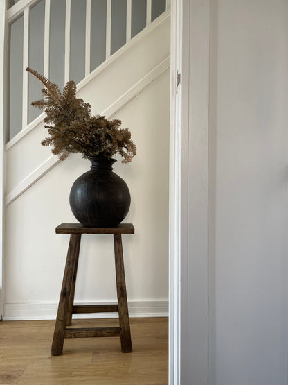 Dark wooden vintage vase