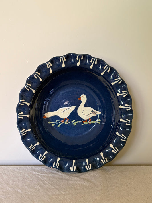 Vintage blue scalloped decorative bowl with ducks