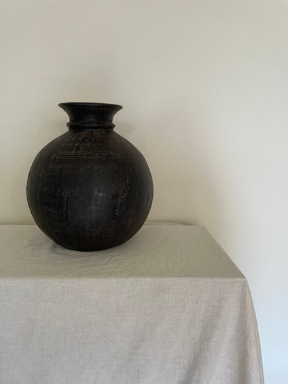Dark wooden vintage vase