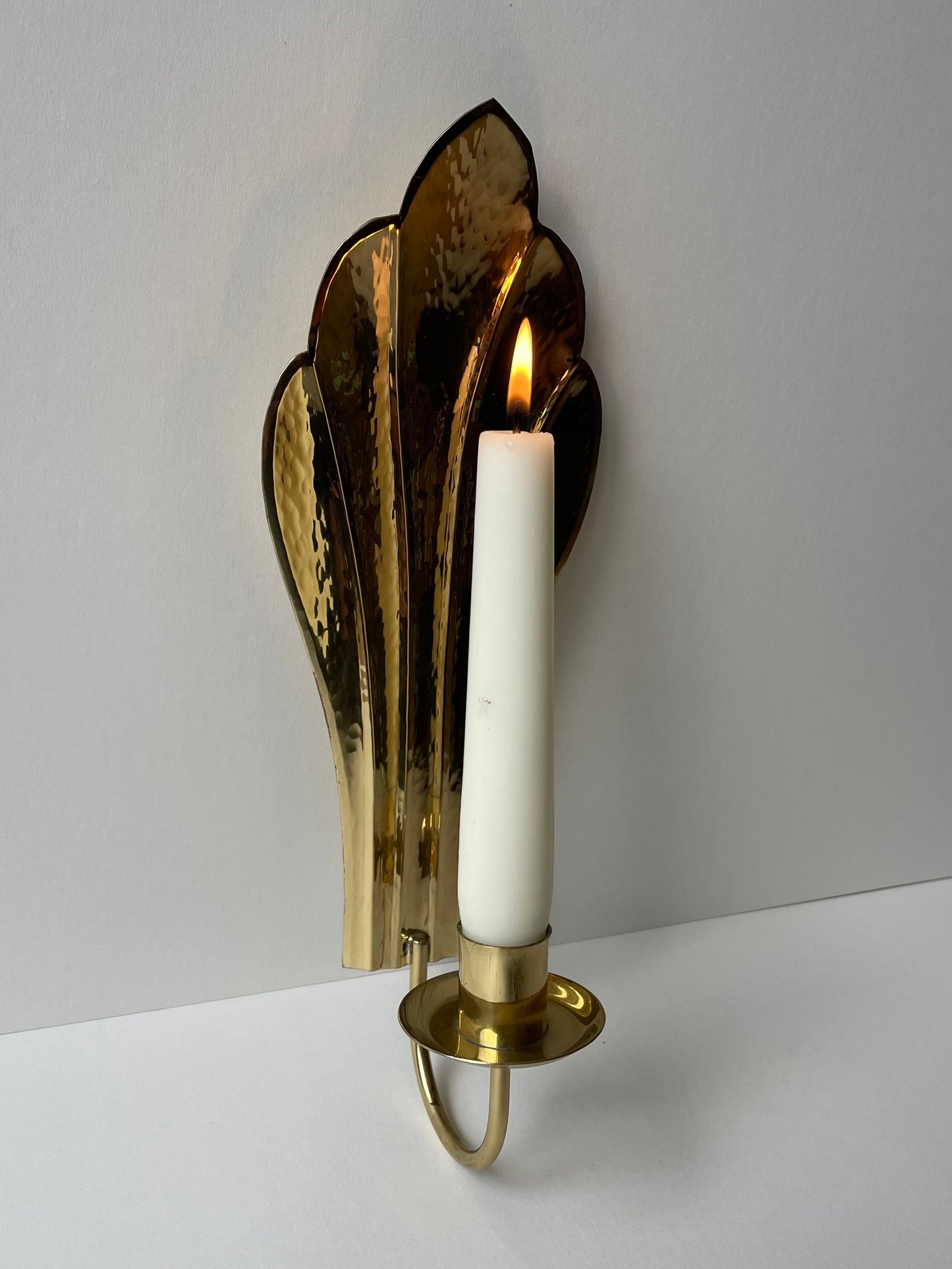 Brass hammered shell wall sconces