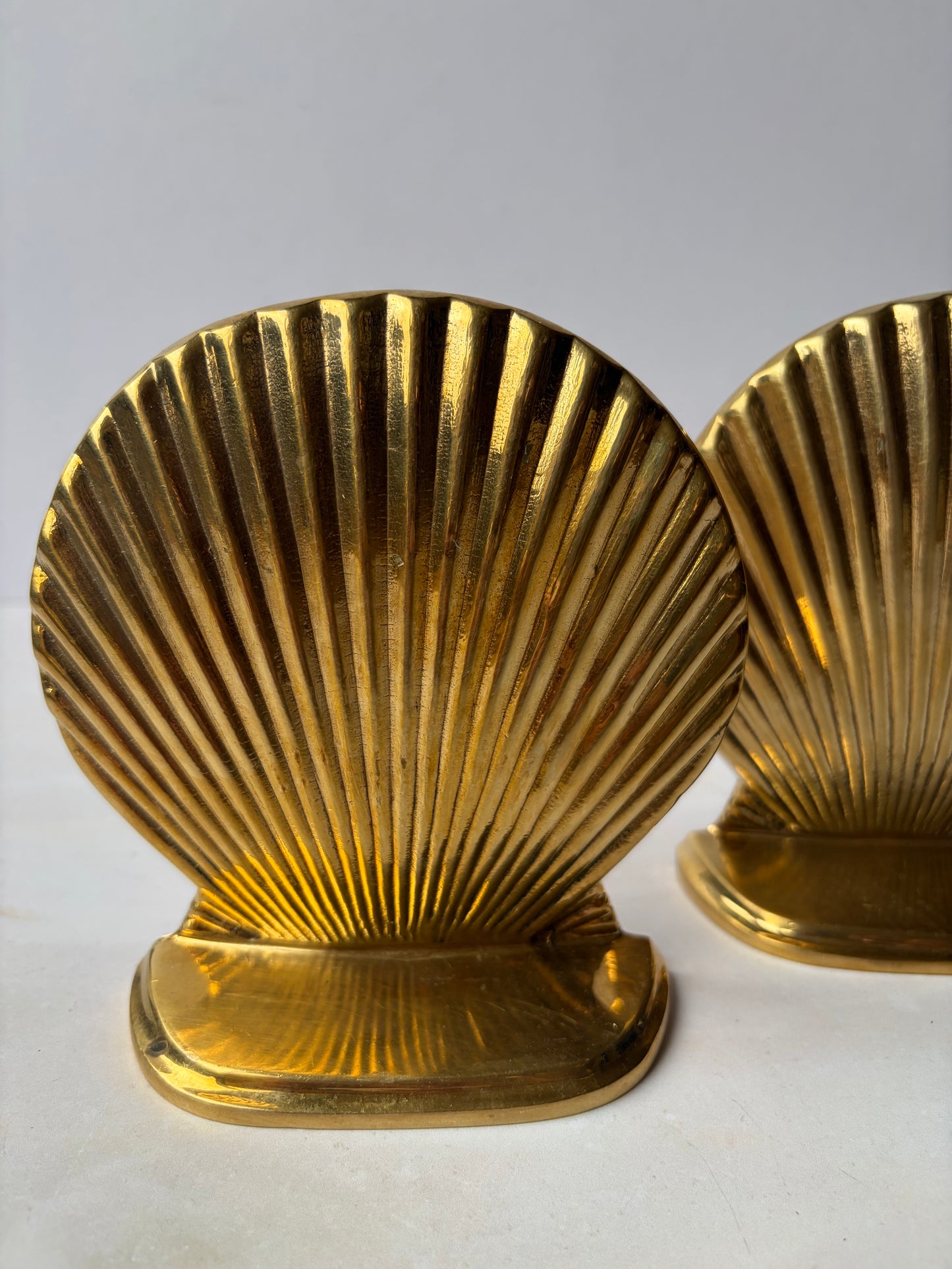 Vintage solid brass shell bookends