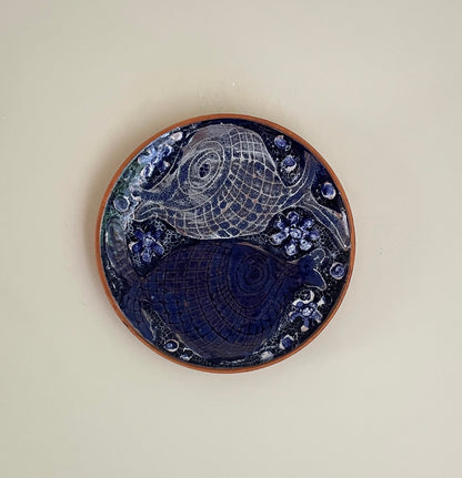Blue wall plate of fish