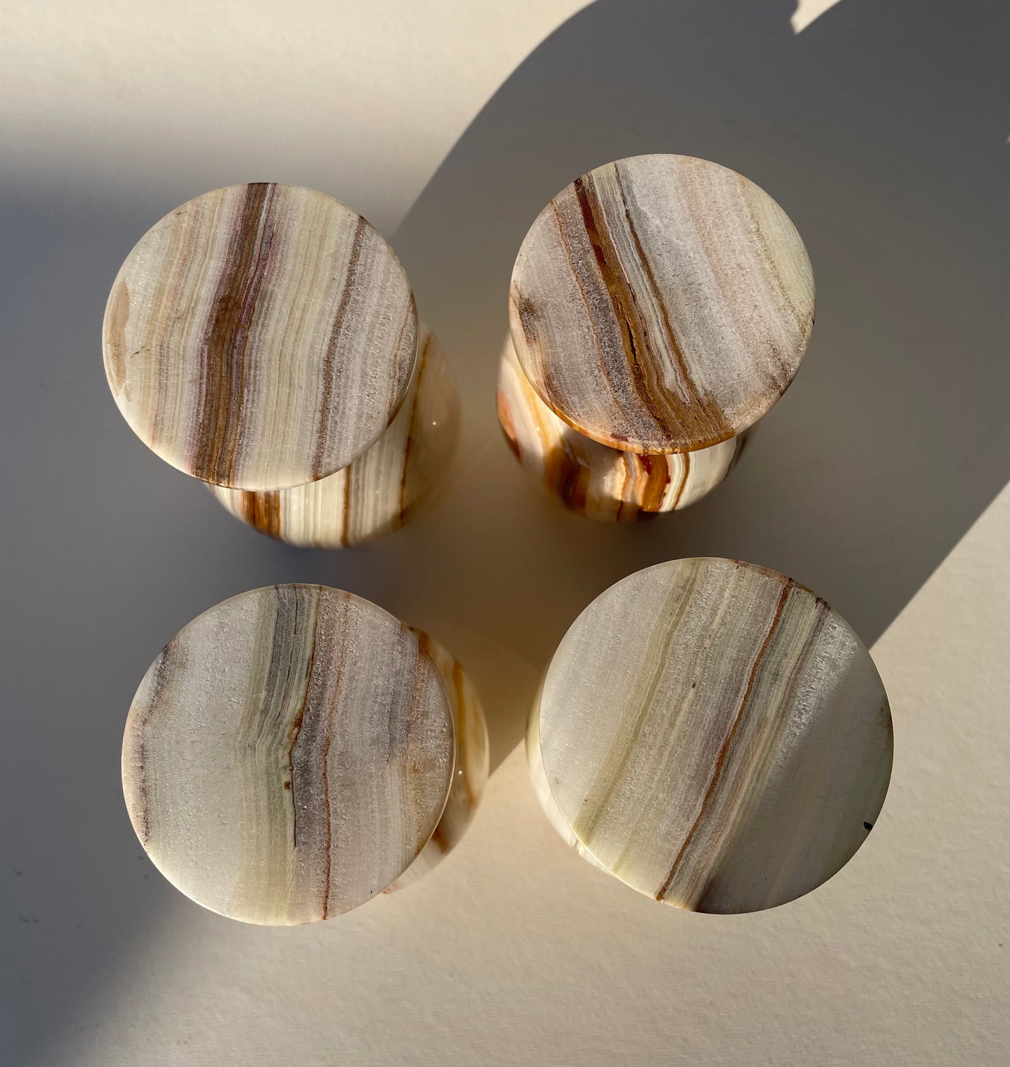 Set of four onyx white and brown goblets