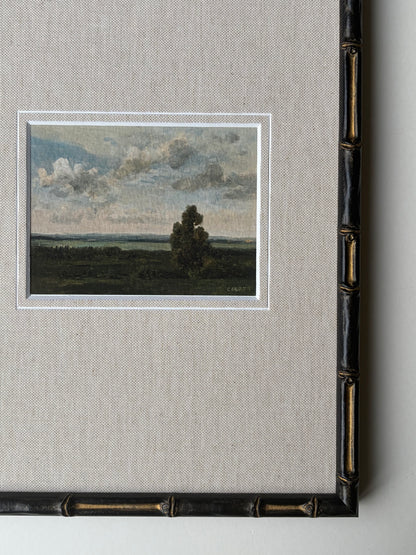 Framed cloudy countryside with mount