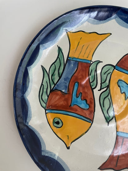 Vintage hand painted Mexican wall plate of colourful fish