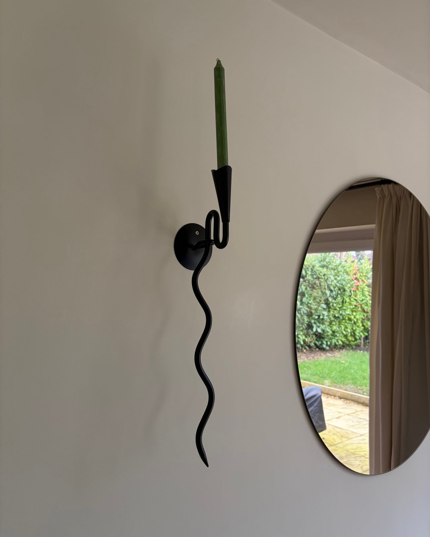 Pair of vintage wrought iron black squiggle candle wall sconces