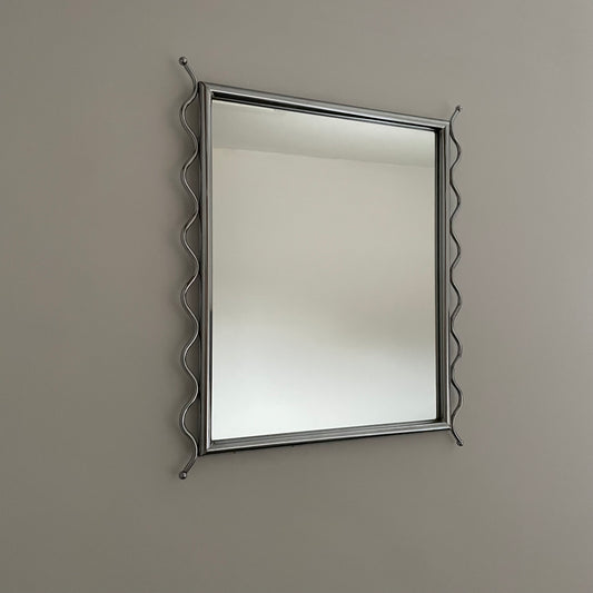 Chrome vintage mirror with wavy edges