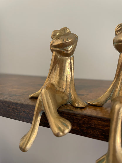 Pair of brass frogs