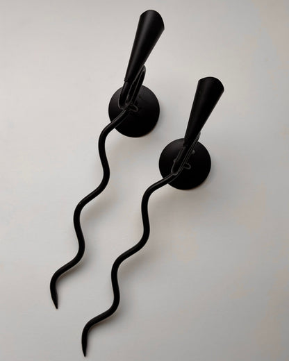Pair of vintage wrought iron black squiggle candle wall sconces