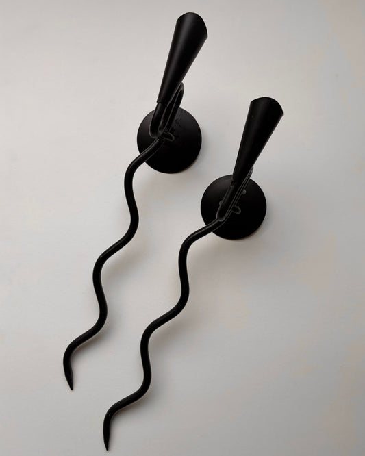 Pair of vintage wrought iron black squiggle candle wall sconces